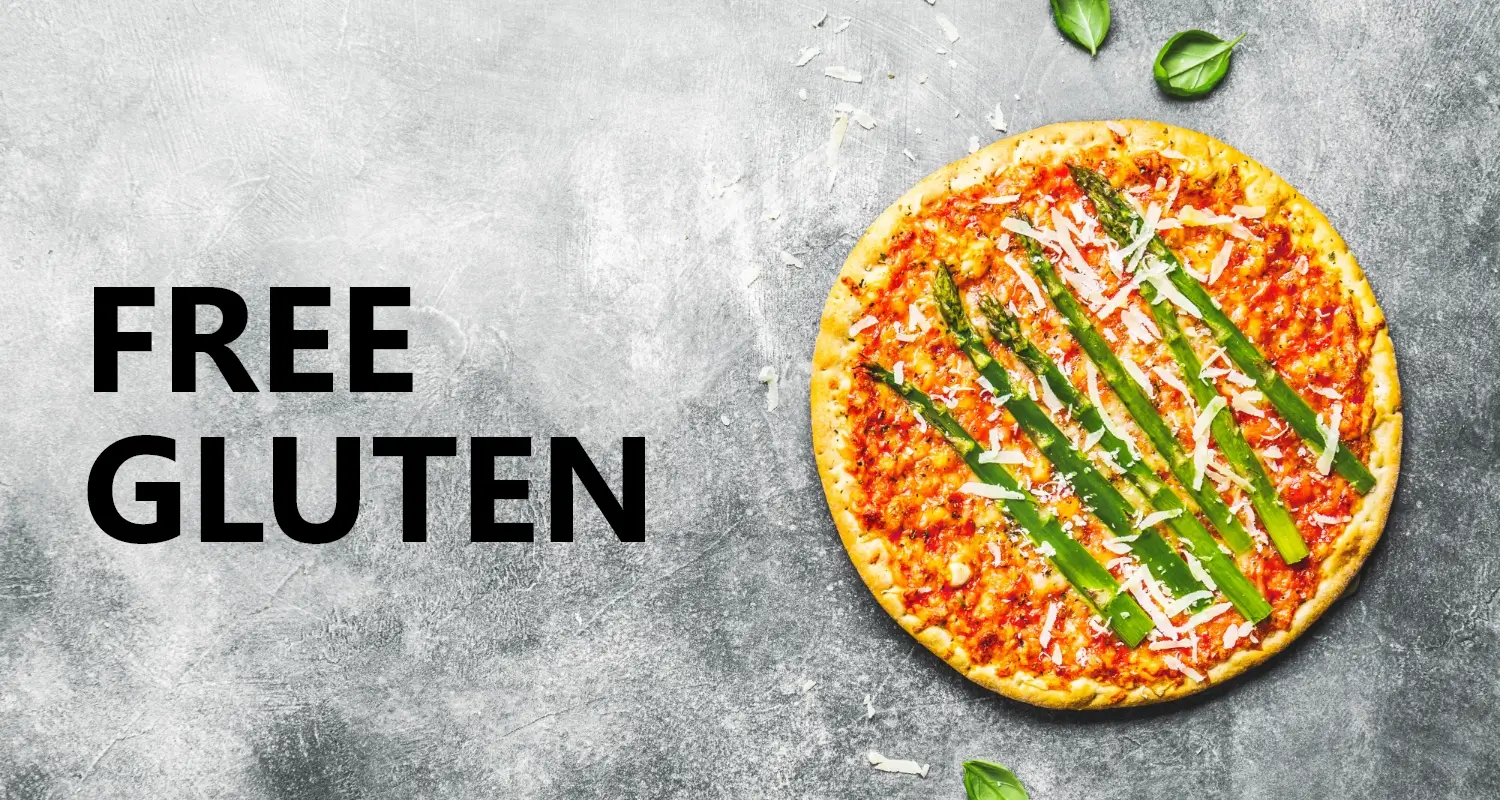 Gluten-free pizza with fresh basil on a textured background, offering healthy options.